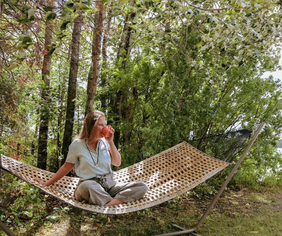 Picture of Jenna Harding in a Hammock Drinking Coffee | Instagram Bio